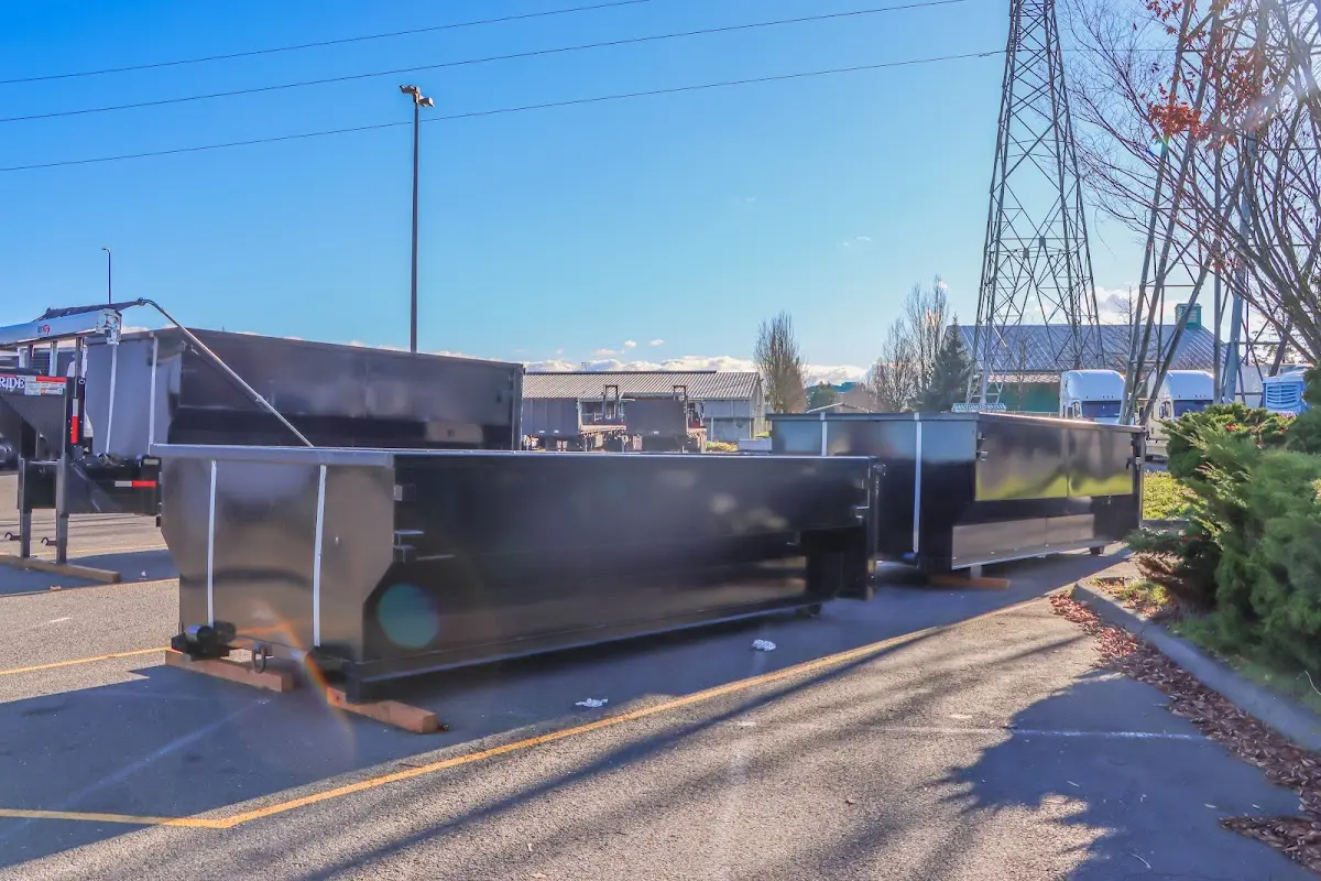 Roll-off dumpster ready for waste disposal at job site for Commercial Dumpster Rental in Westford